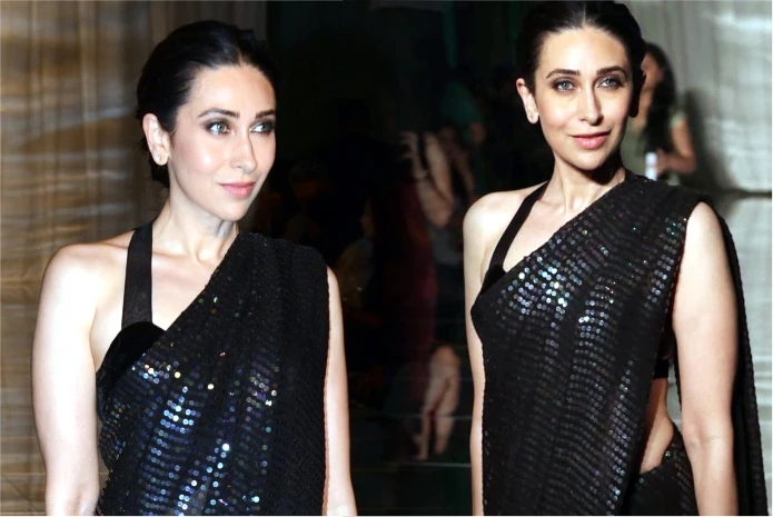 Karishma Kapoor in black sequin saree