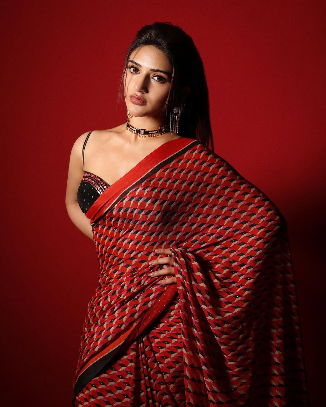 Actress sreeleela photo in classic red and black saree