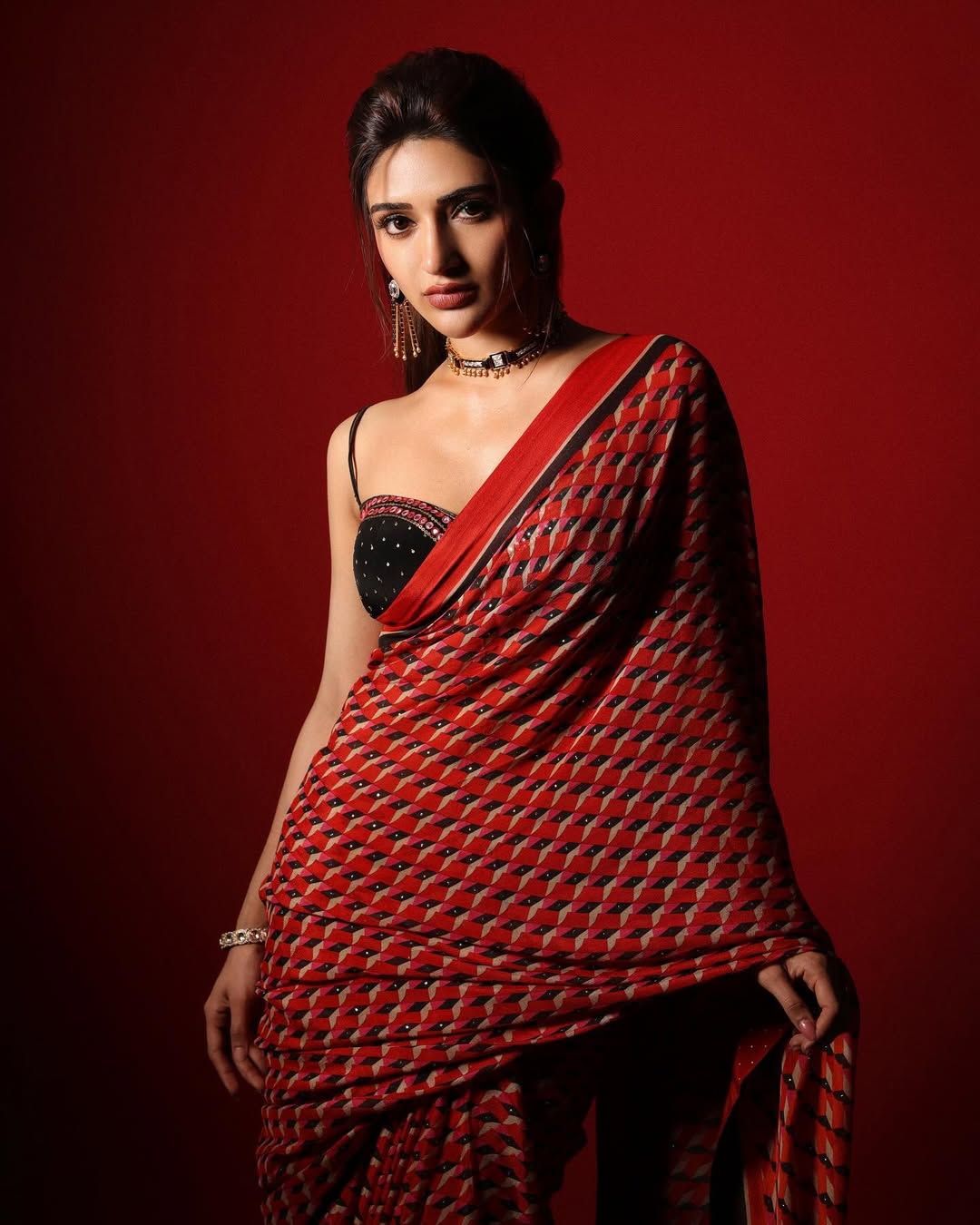 sreeleela hd image in classic red and black saree