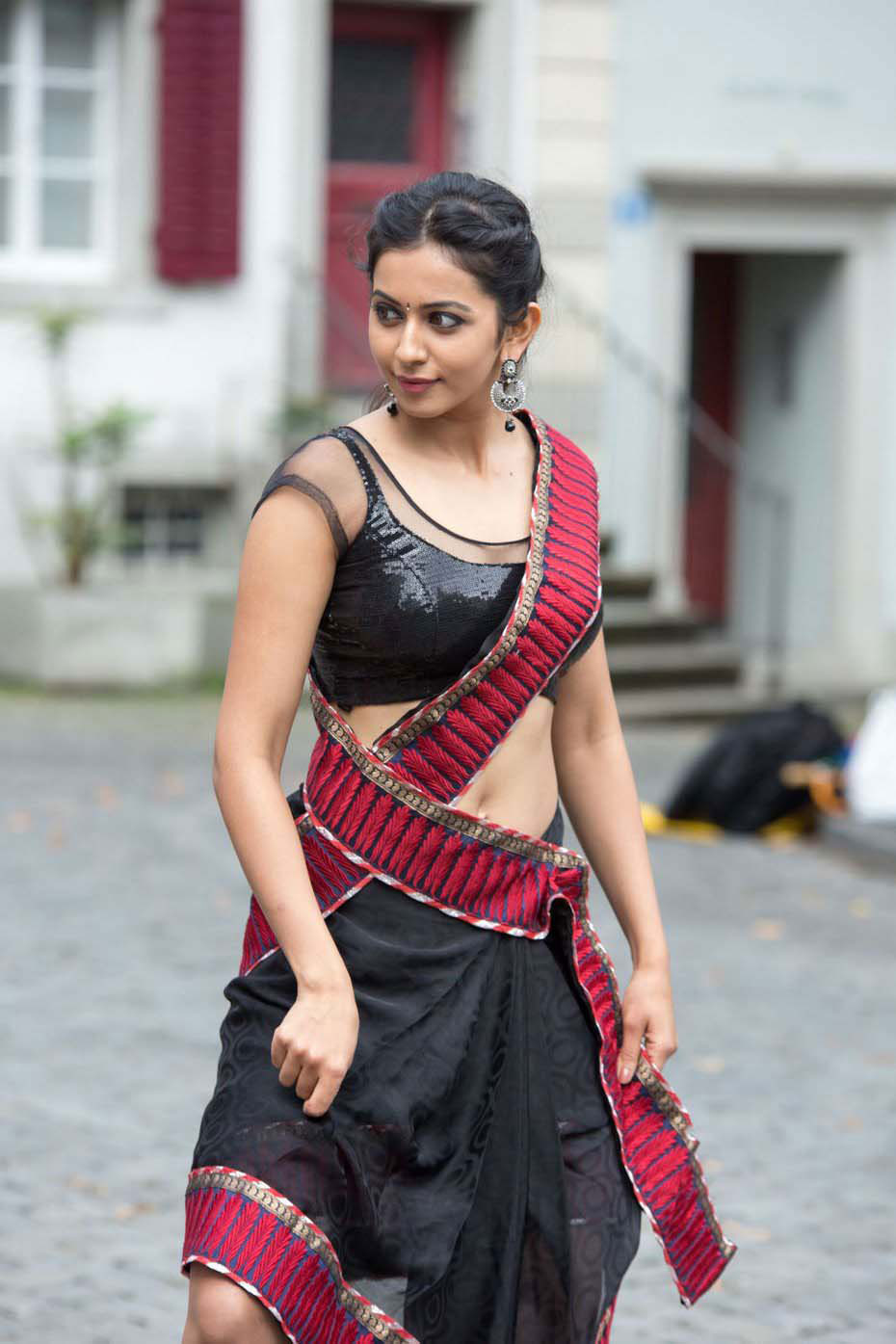 Rakul Preet Singh in half saree photos dancing for a song