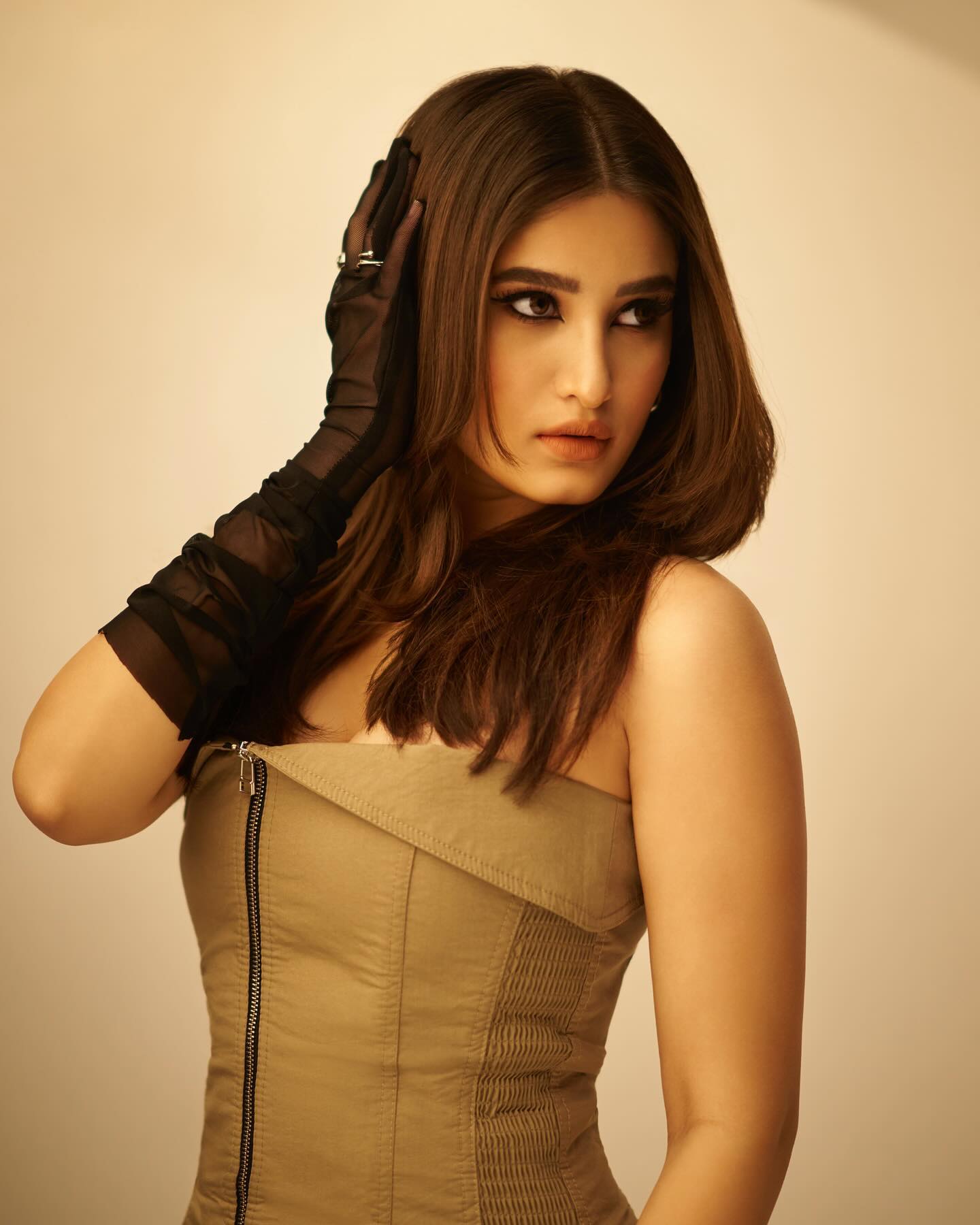 Rasha Thadani photos off shoulder brown outfit