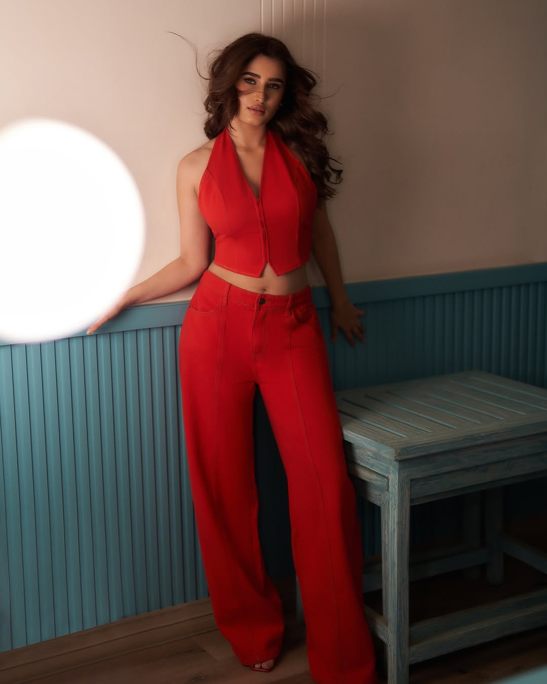 Rasha Thadani red dress in red top and red pant