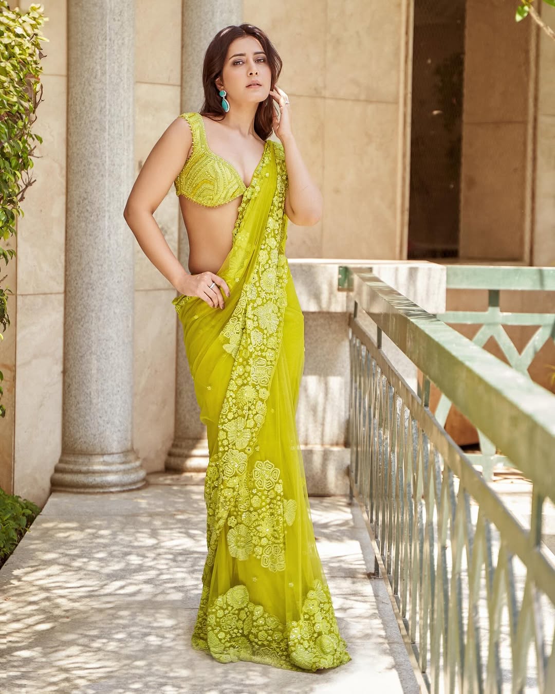 Rashi Khanna in yellow saree portrait in saree